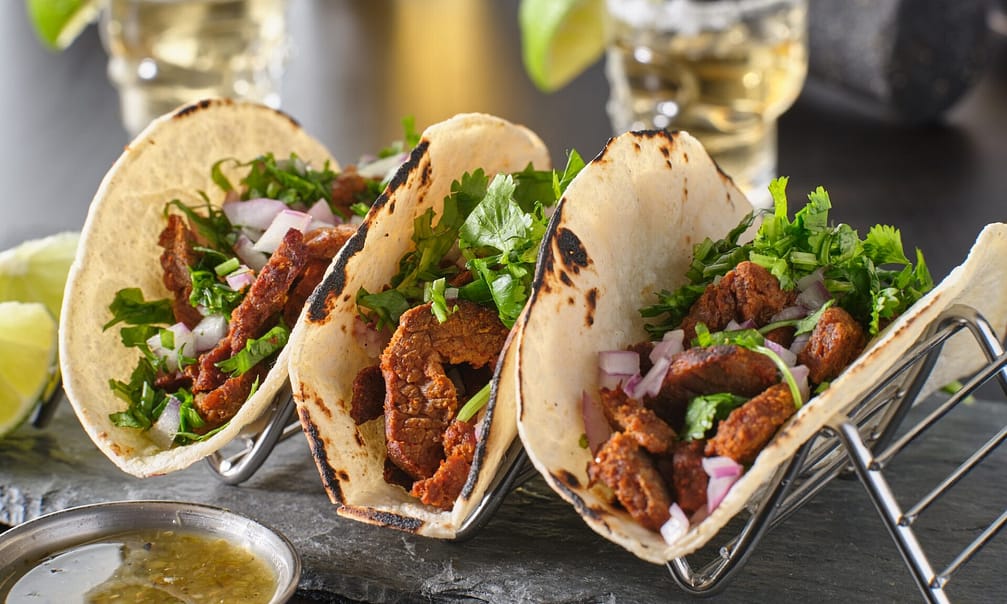Three mexican carne asada street-tacos