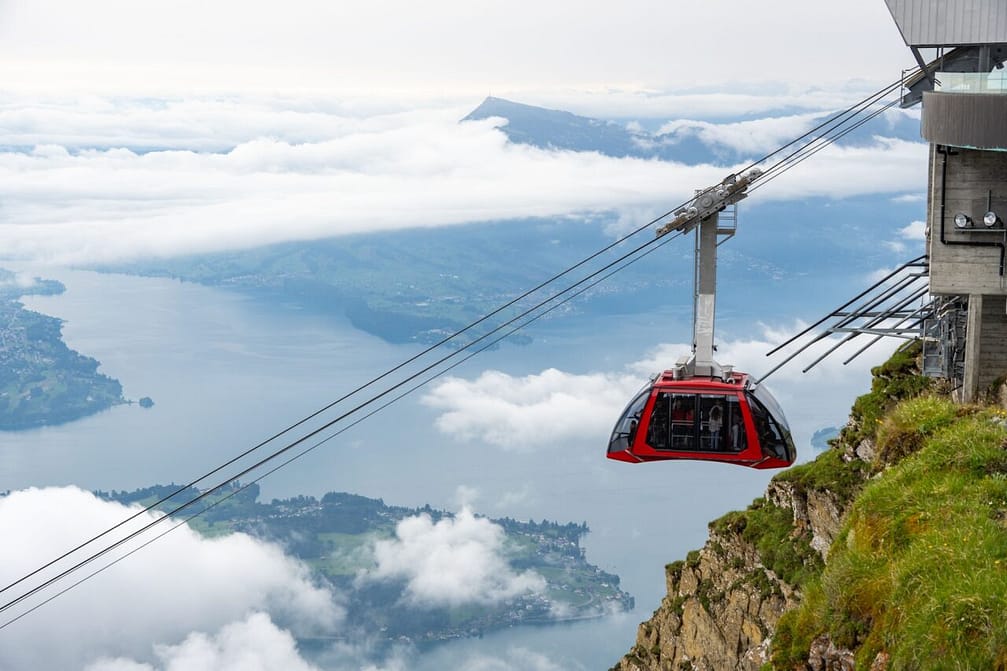 Elevated cable car at the top of a mountain above the clouds, Mount Pilatus, Switzerland