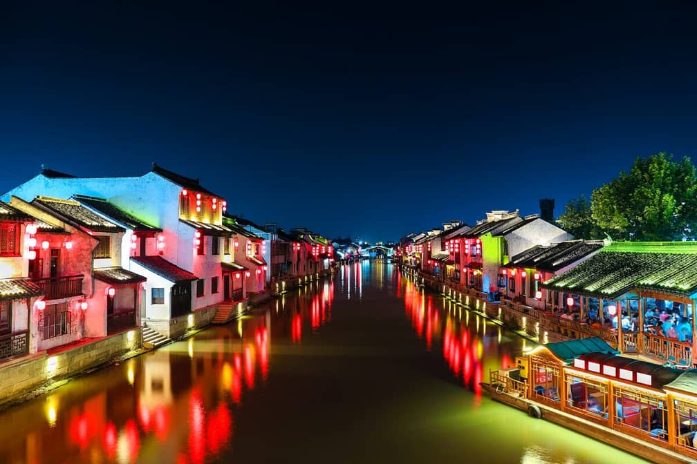 chinese ancient town with grand canal at night