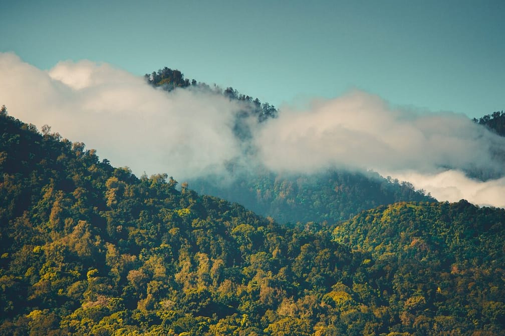 cloudy mountain peaks in sunny day bali indonesia