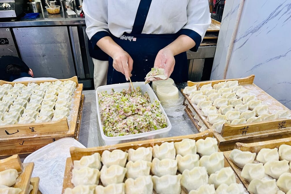 Making dumplings at a dumpling restaurant in Shanghai. China.