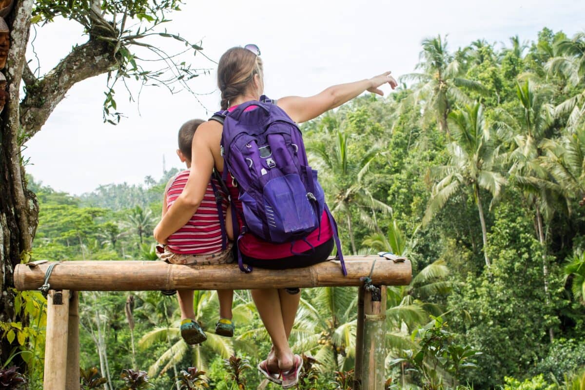 Mother and son watching the view of rice fields in Ubud, Bali