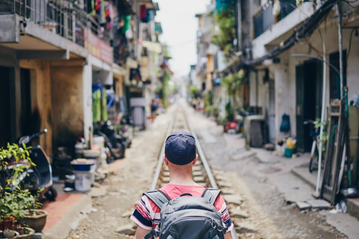 Traveler in Hanoi Train Street