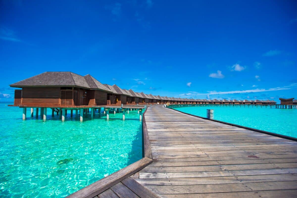 Water bungalows and wooden jetty on Maldives