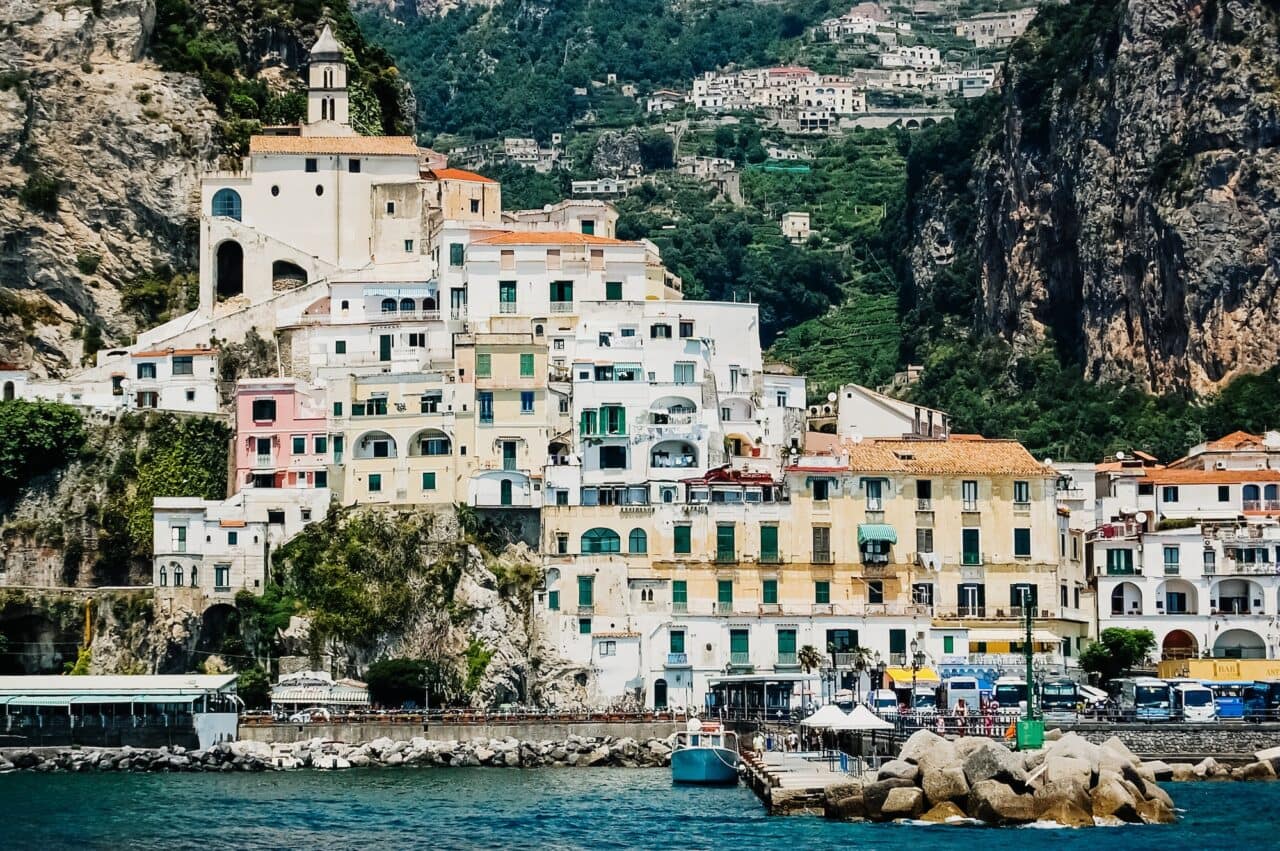 colorful houses built on the side of a hill in Sorrento