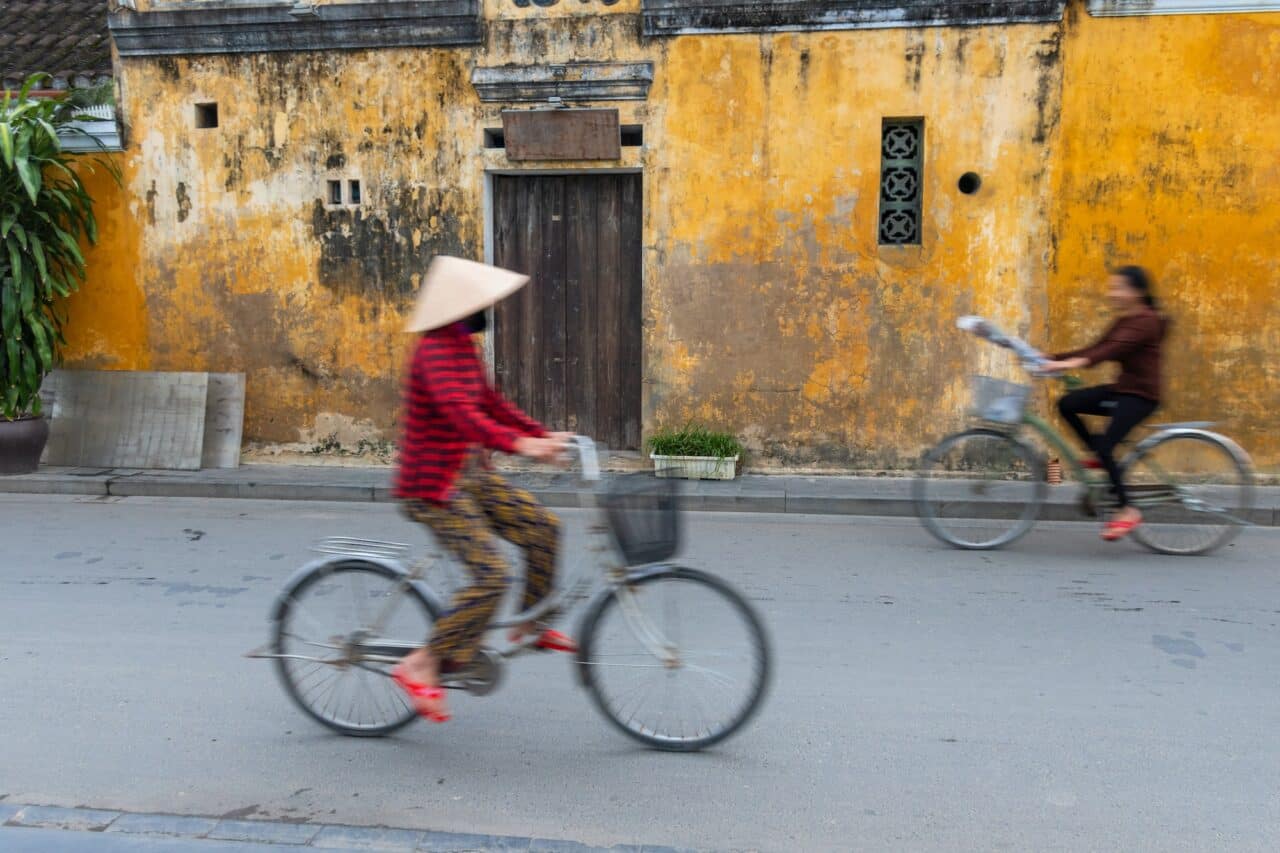 Cyclists on a street in Vietnam