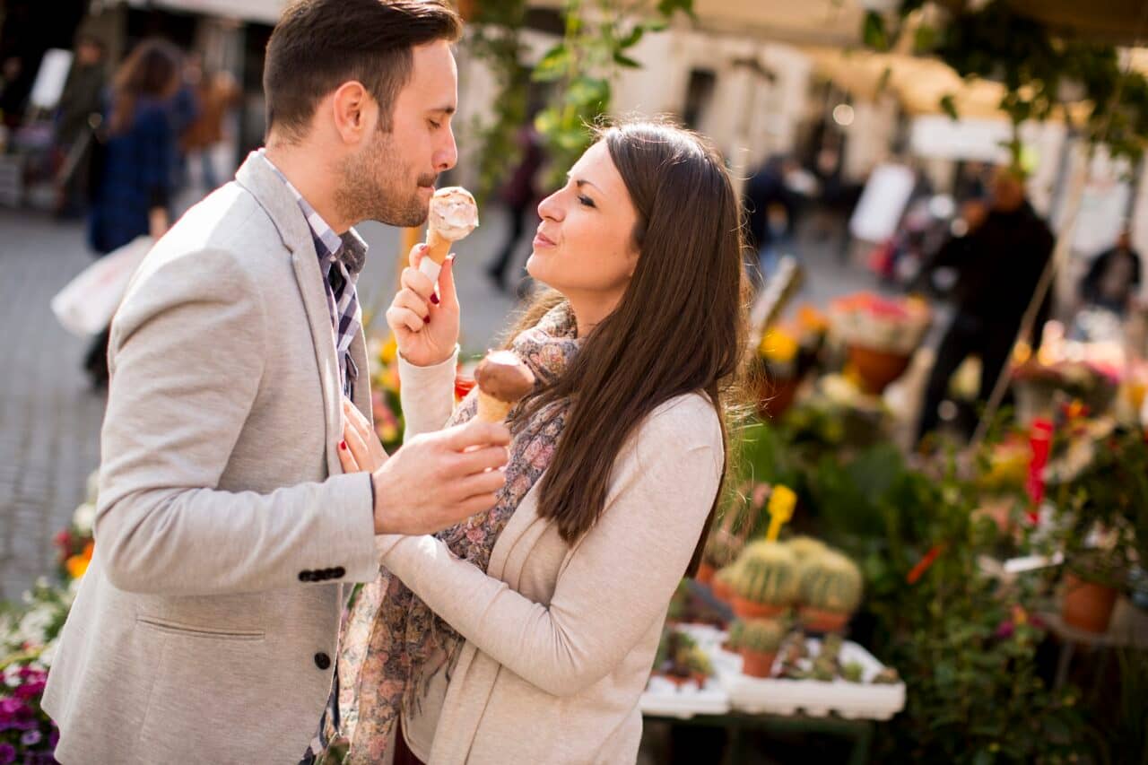 Loving couple having an ice cream in Rome, Italy