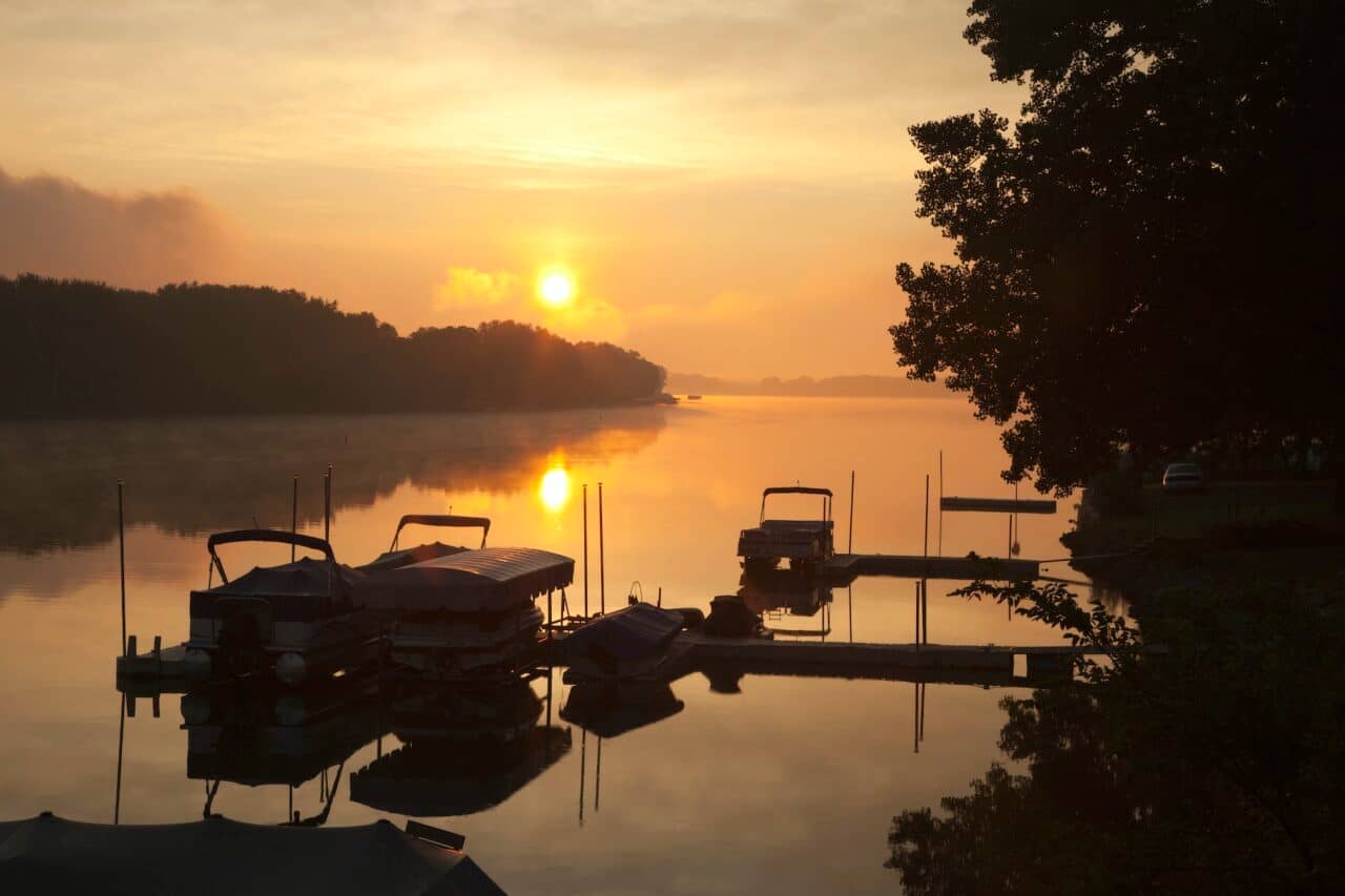 Docks and Boats on Calm Lake at Sunrise in Wisconsin