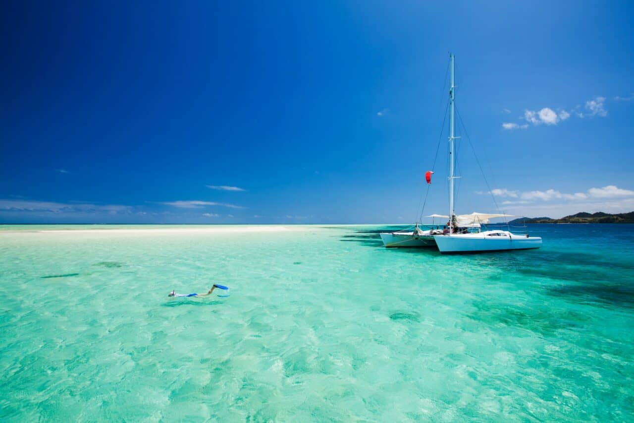 Snorkeling in shallow water off the catamaran