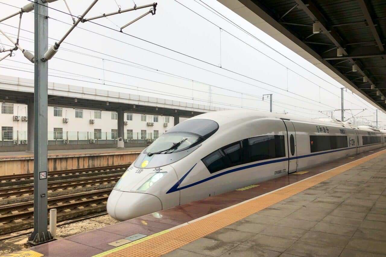 The high speed train at the platform in a railway station in China.