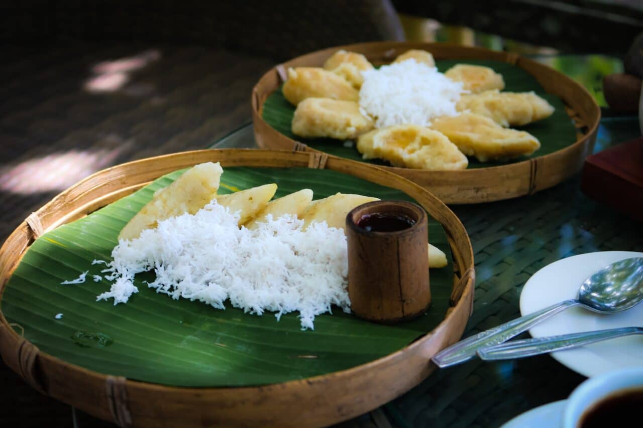 Traditional balinese sweets by rice and bananas. Balinese culinary experience in Ubud