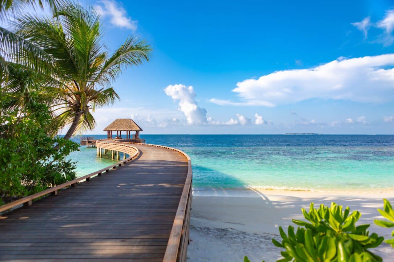 DUSIT THANI MALDIVES, MALDIVES, SEPTEMBER 24, 2017: Foot path to jetty