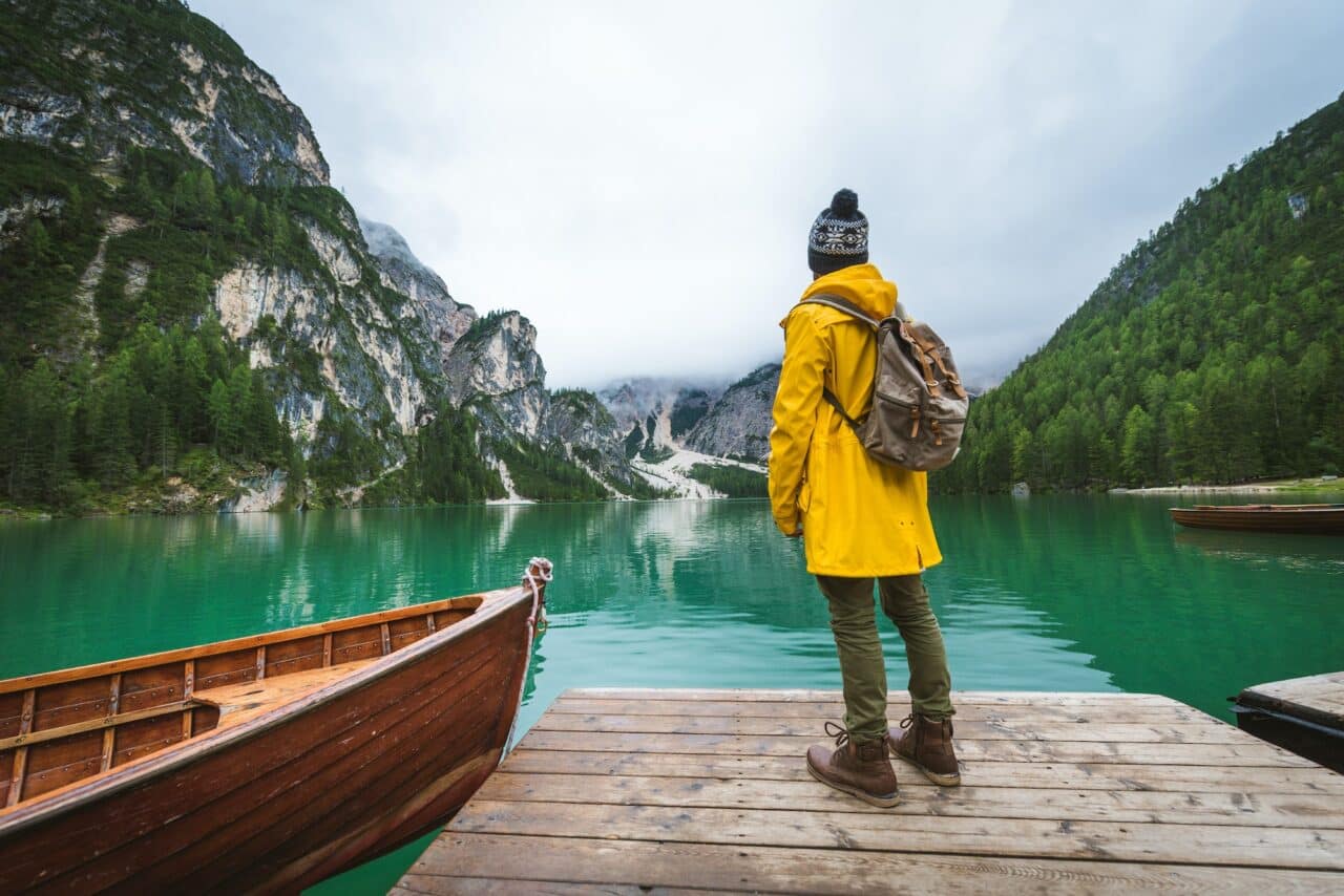 Tourist at Braies lake, Italy