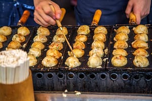 Takoyaki being grilled in Osaka