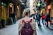 Woman strolling on street during vacation